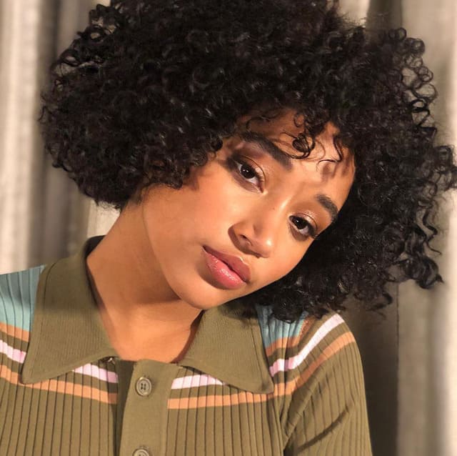 Curly neutral bob haircut
